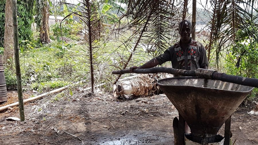 Artisanal oil producer in Uganda (photo credit Claude A. Garcia)